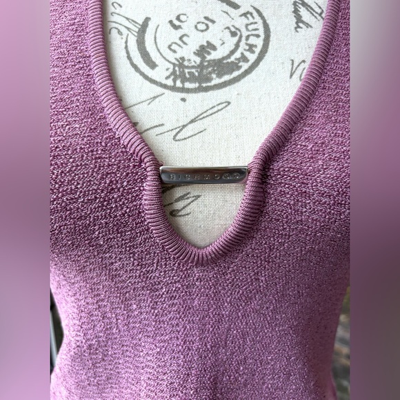 Knit Midriff Top with Plunge Neckline
EUR 44 (runs small)
Like New / Never Worn - Picture 5 of 8